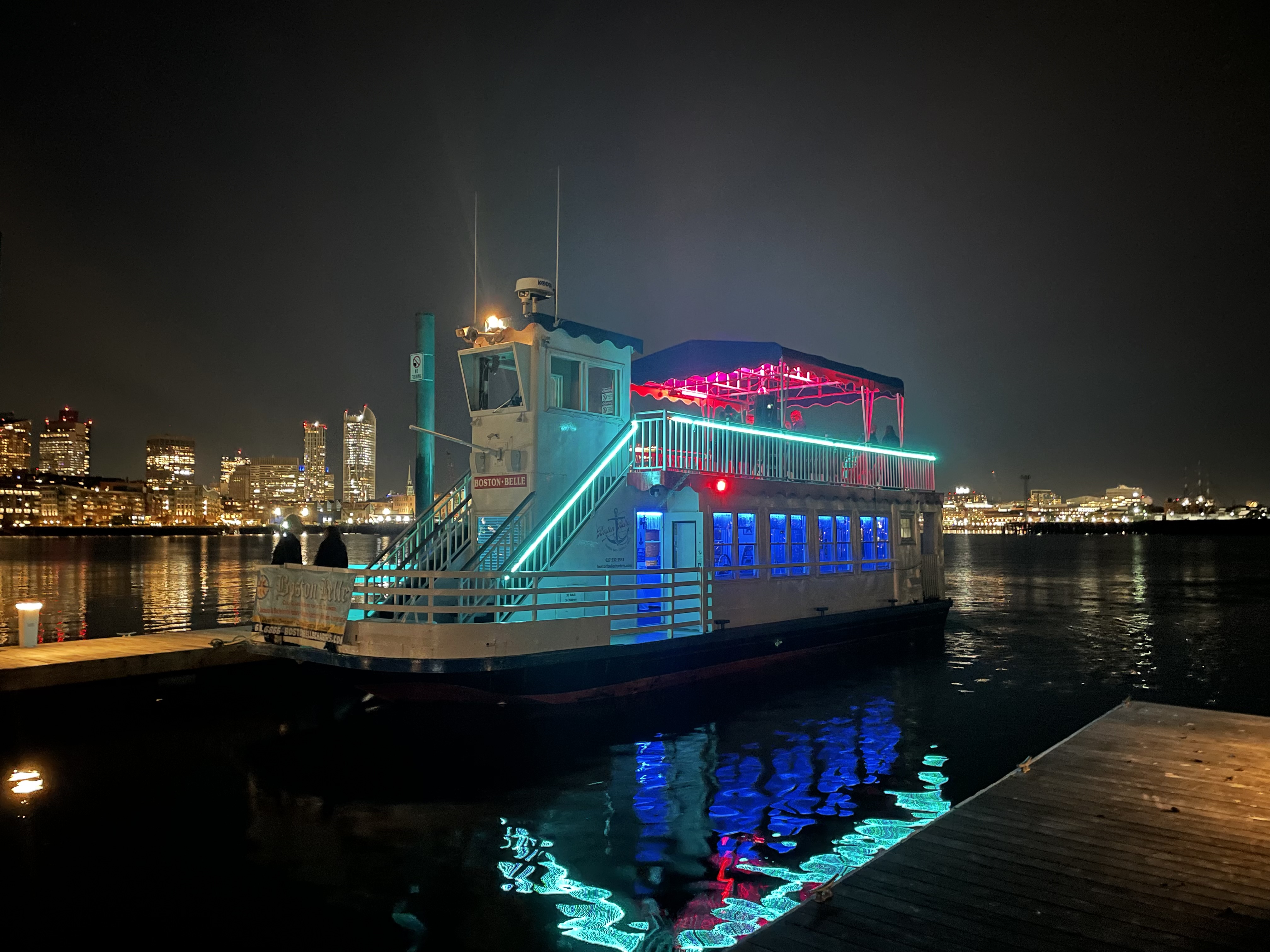 Boston Harbor charter boat by night